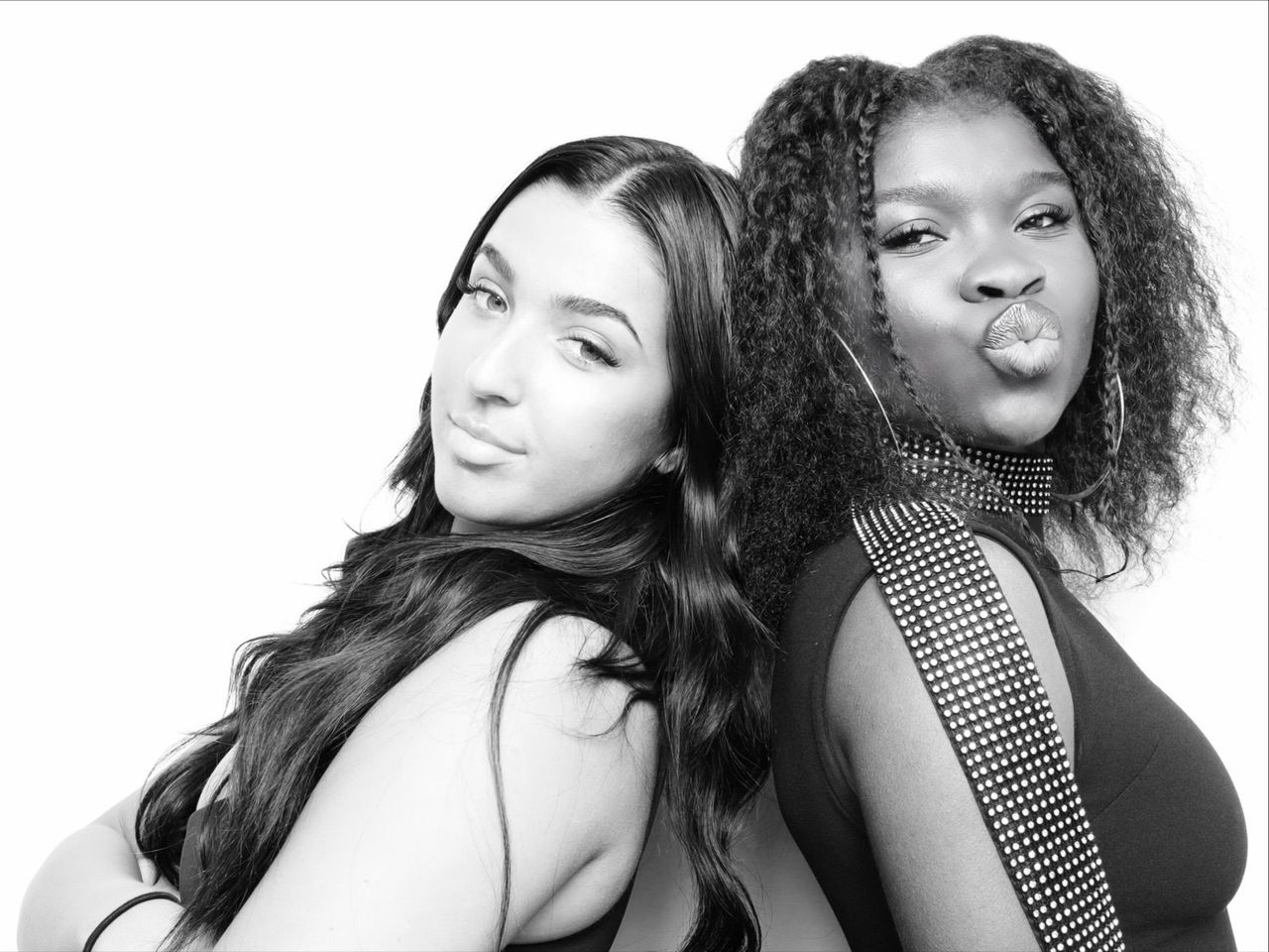 Guests posing in glam booth